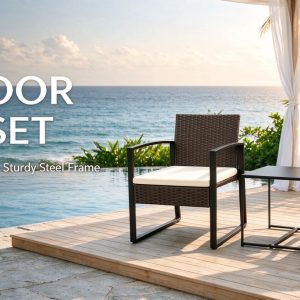 Outdoor patio set with cream cushions beside a pool and ocean view